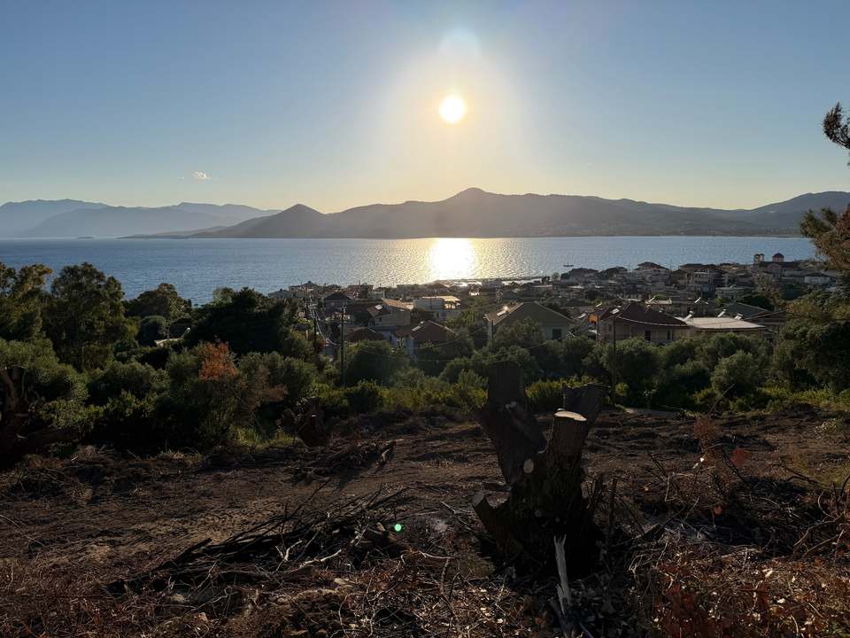 Evening sun over Paleros bay and the Ionian islands, seen from the plot